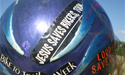 Close-up of blue helmet with sticker - 'Jesus Saves Bikers Too'